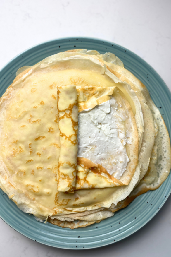 Crepes with sweet cream cheese filling.
