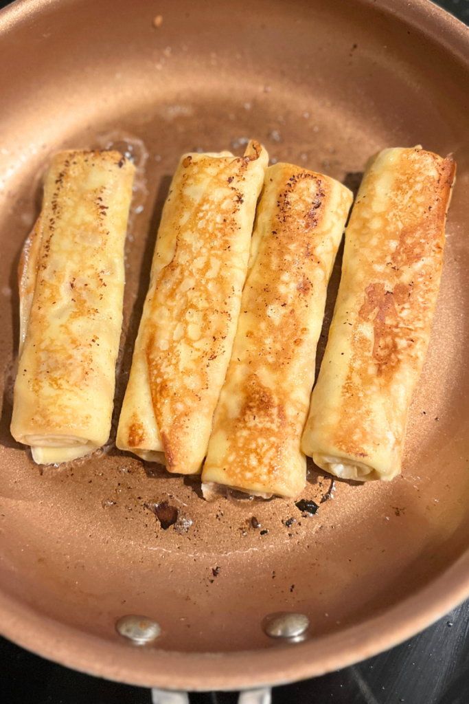 Crepes with sweet cream cheese filling.