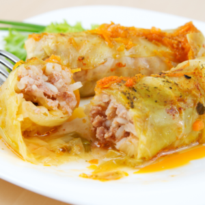 Stuffed cabbage rolls on a plate.