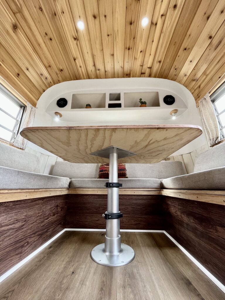 1972 streamline travel trailer dinette with an air powered pedestal table. 