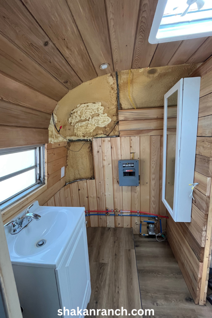 airstream bathroom renovation with cedar ceiling and pine walls. 