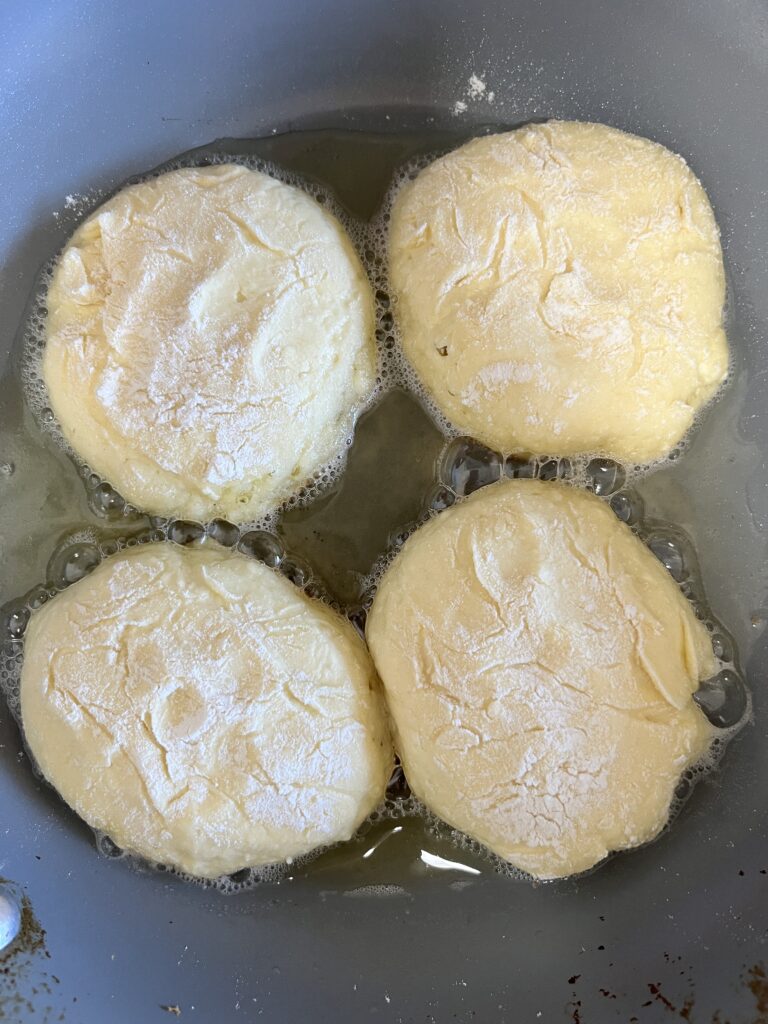 Sourdough cottage cheese pancake frying.