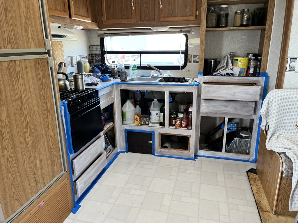 Primed kitchen cabinets in rv restoration.