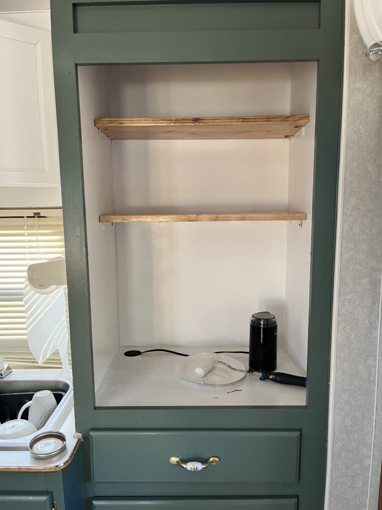 Floating shelves for a tea/coffee station.