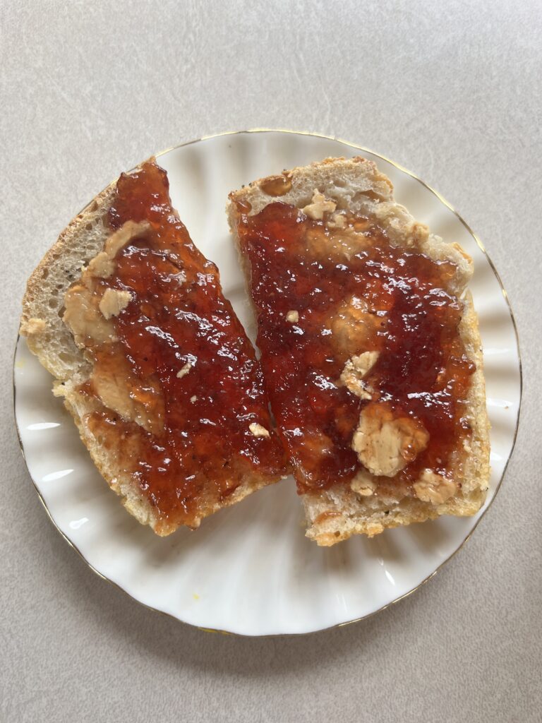Sourdough bread with peanut butter and jelly. 
