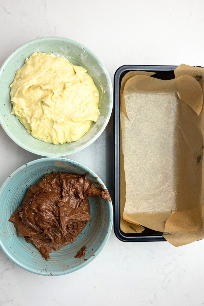 Mixed batter for Sourdough Marble Loaf Cake.