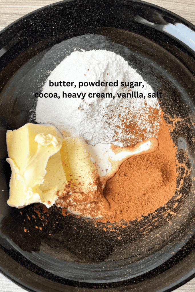 Ingredients in a bowl for chocolate buttercream. 