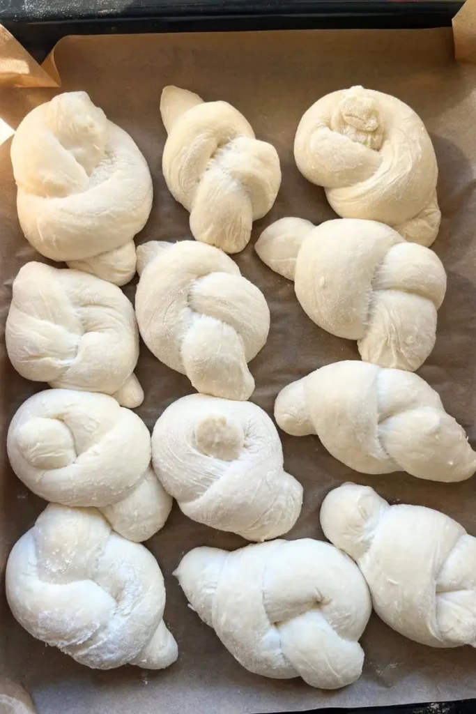Sourdough garlic knots proofed and ready to bake. 