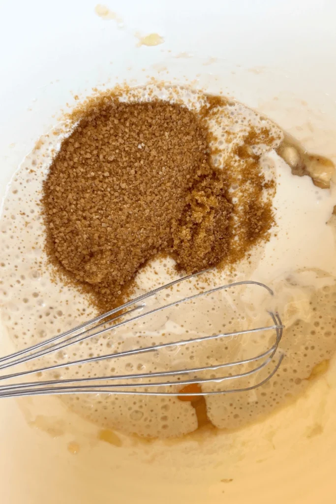Sourdough banana bread wet ingredients in a bowl. 