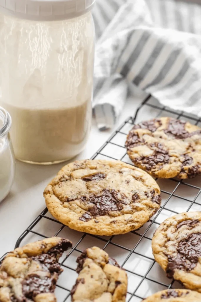 Sourdough Chocolate Chip Cookies on a cooling rack. 
