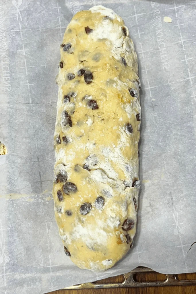 Sourdough stollen bread with homemade marzipan shaped and ready to proof. 