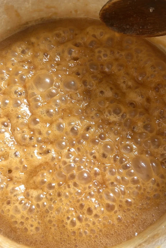 Thickening ginger honey mixture turning into chewy ginger honey lemon candy.